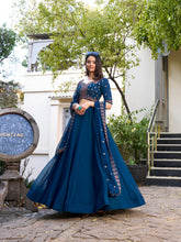 Firozi Color Plain With Sequins And Thread Embroidery Work Georgette Lehenga Choli